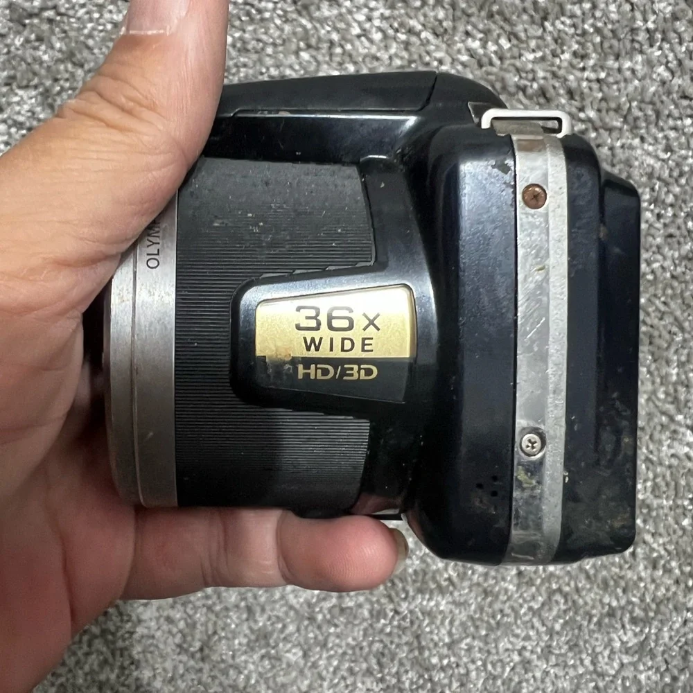 Olympus sp-815UZ 14 Megapixel Dogital Camera Untested